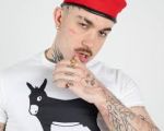 LA FAMA con LA CALVA TATUADA